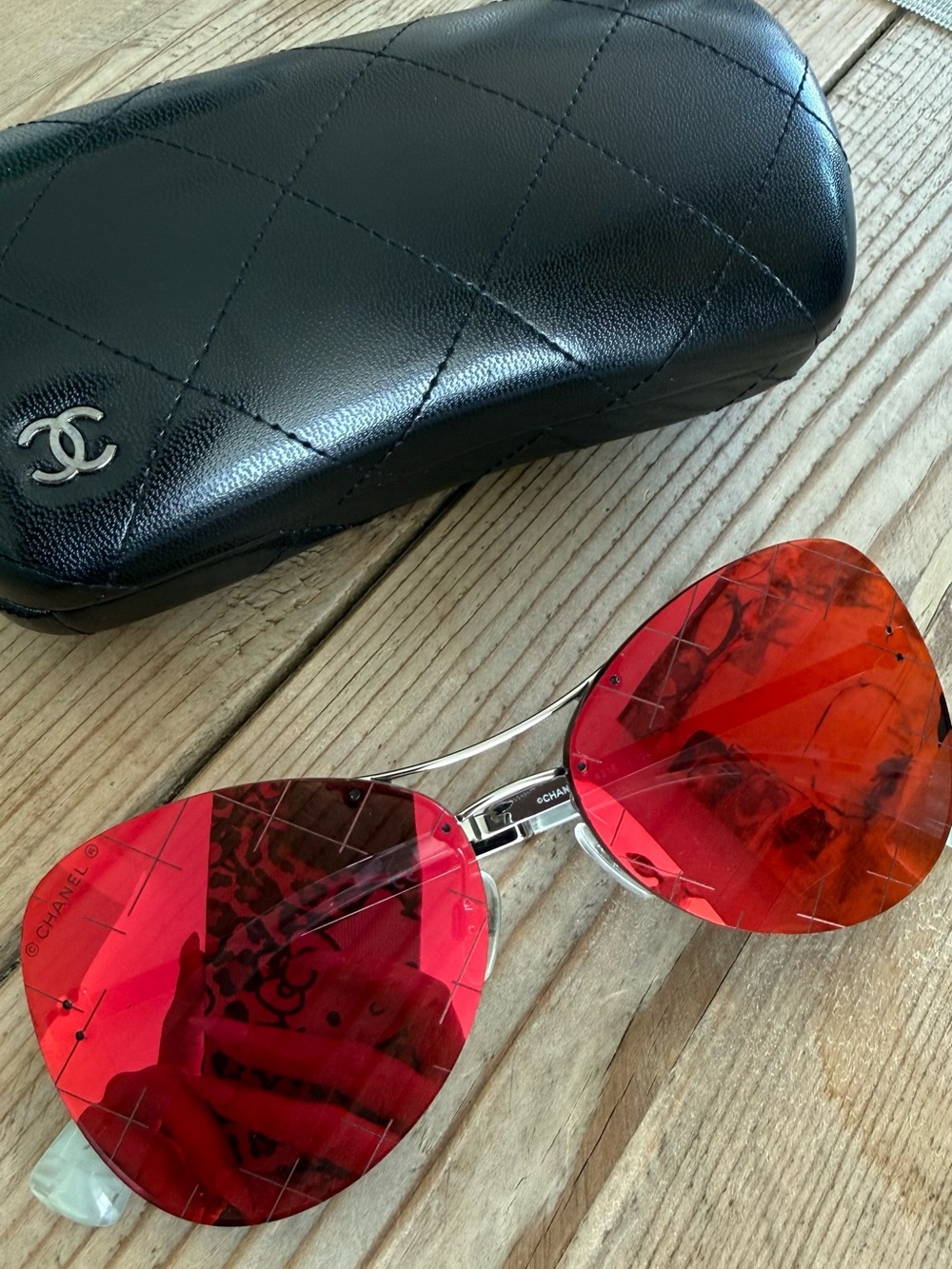 CHANEL Red Lens Aviator Sunglasses with Silver Frame and Black Quilted Case